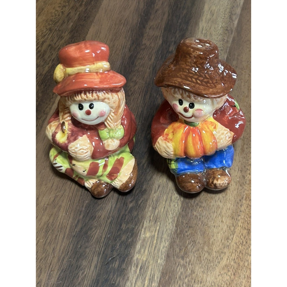 Ceramic scarecrow boy and girl salt and pepper shakers